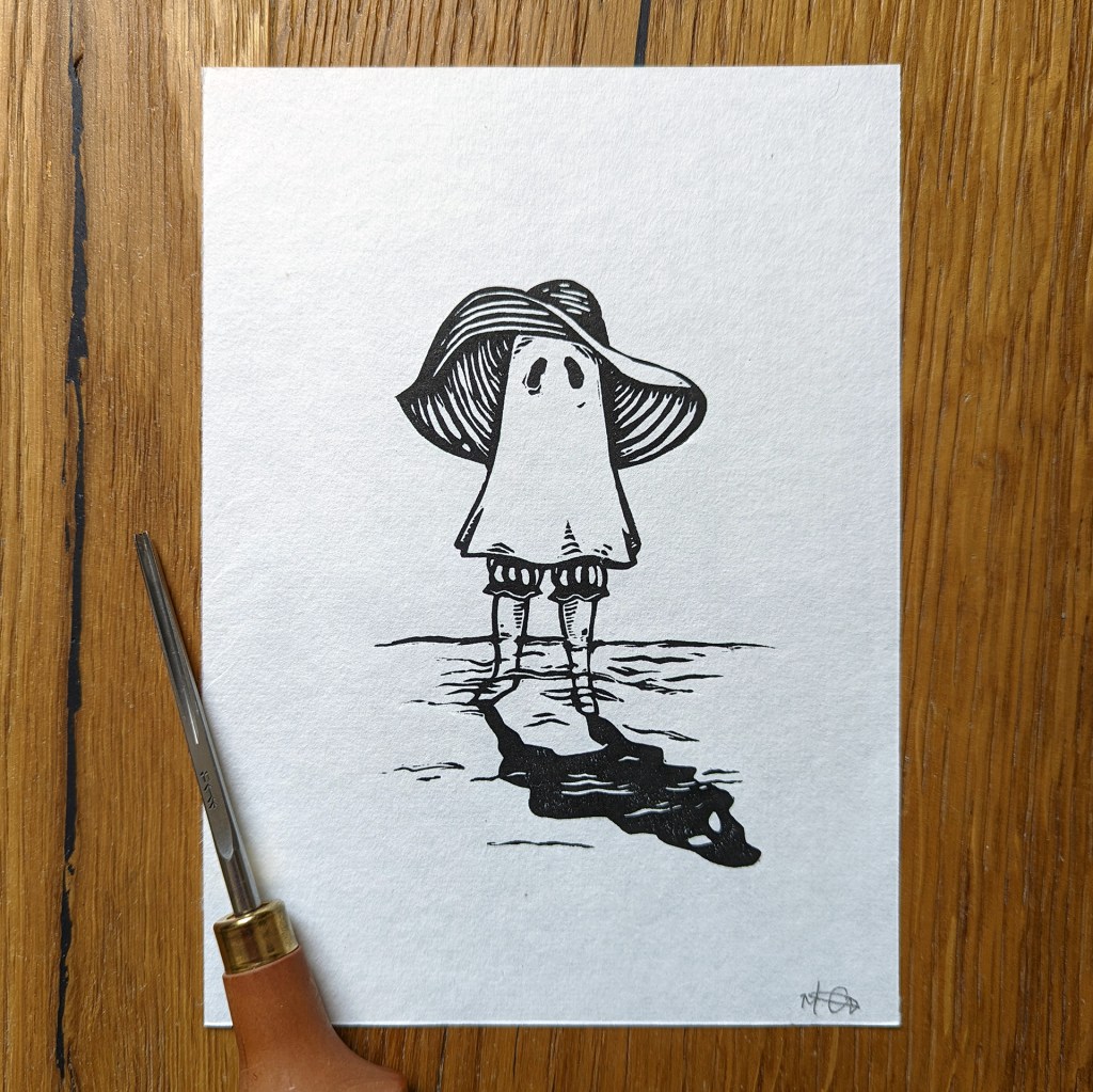 Linoprint of a sheet ghost wearing a sun hat